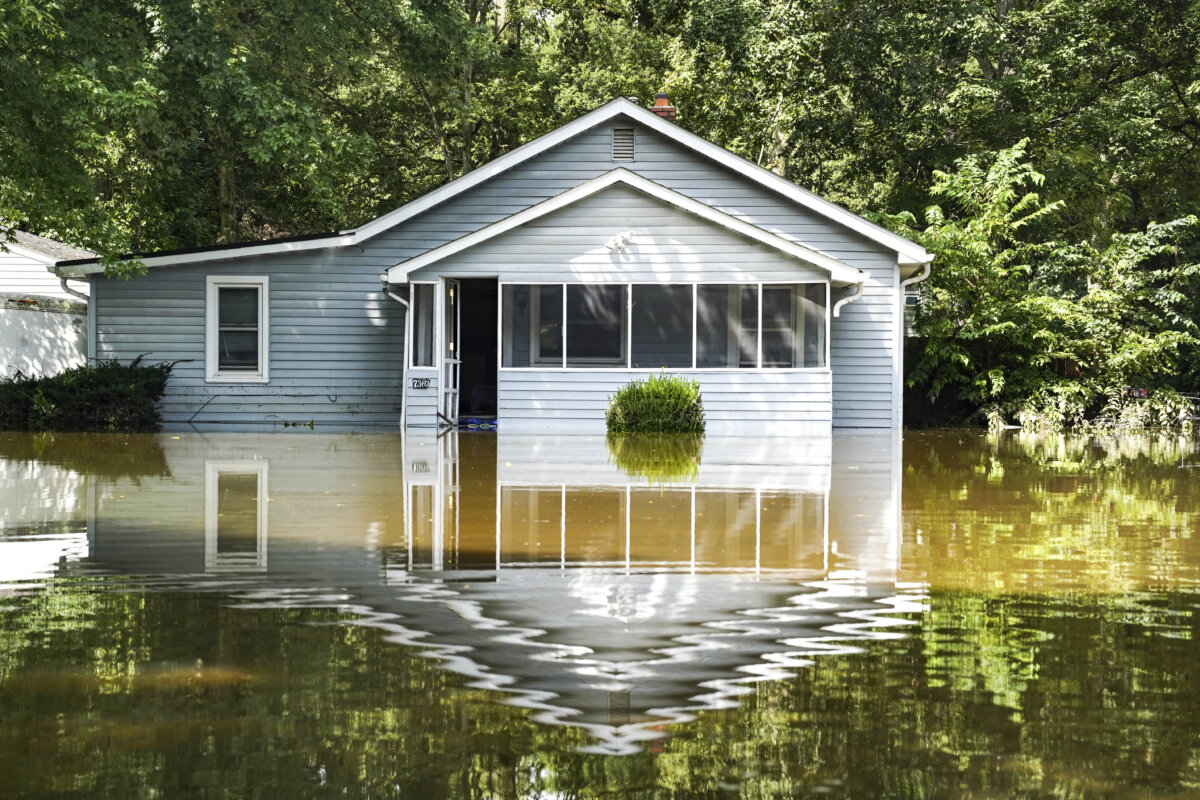 A flooded home is seen in Indianapolis, Sunday, Aug. 16, 2026. (Obed Lamy/AP Photo)