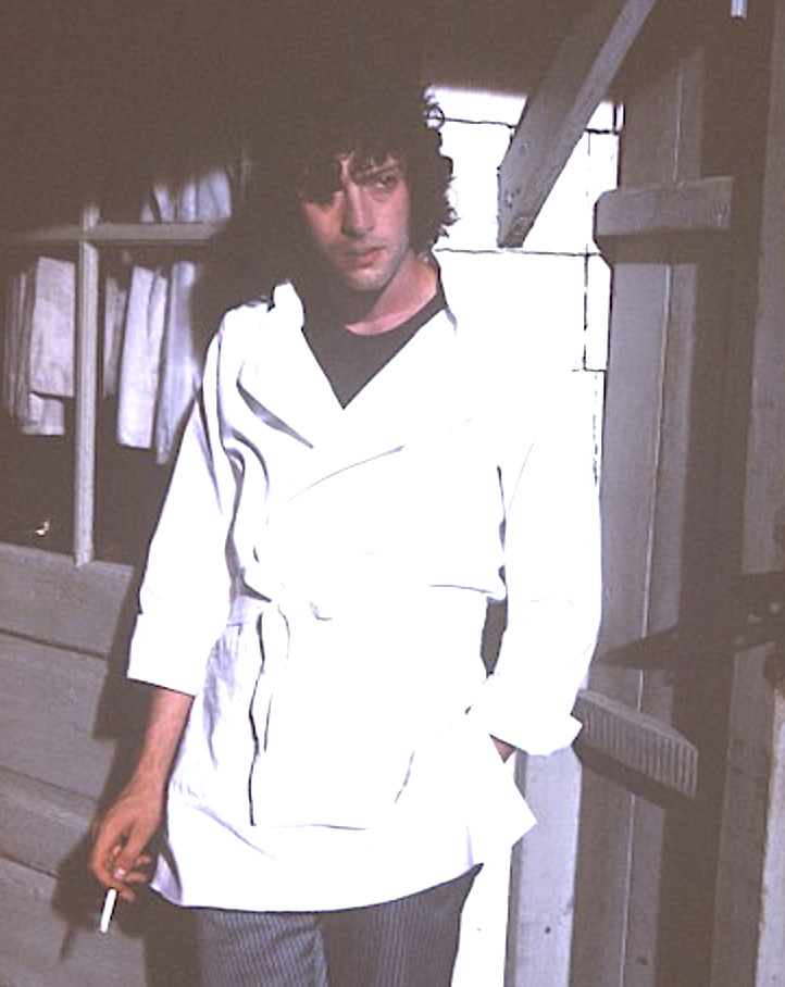 man in chef outfit with cigarette in Tony