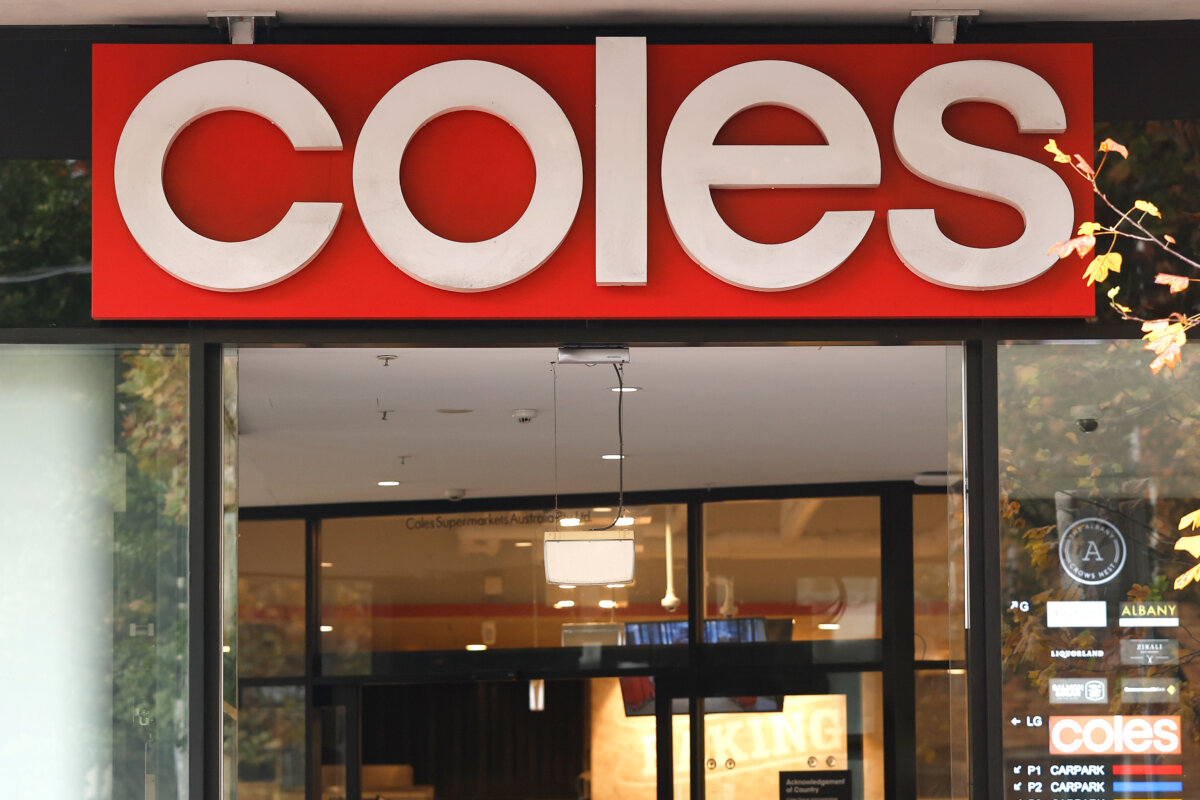 A Coles Group Ltd., sign is seen outside the company's grocery store in Sydney, Australia, on May 27, 2026. (Brendon Thorne/Getty Images)