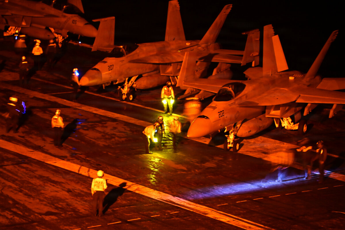 F/A-18 Super Hornets attached to the aircraft carrier USS George Washington prepare for flight operations while operating in the Indian Ocean, on Aug. 18, 2026. (U.S. Navy/Chief Mass Communication Specialist Joshua Karsten)