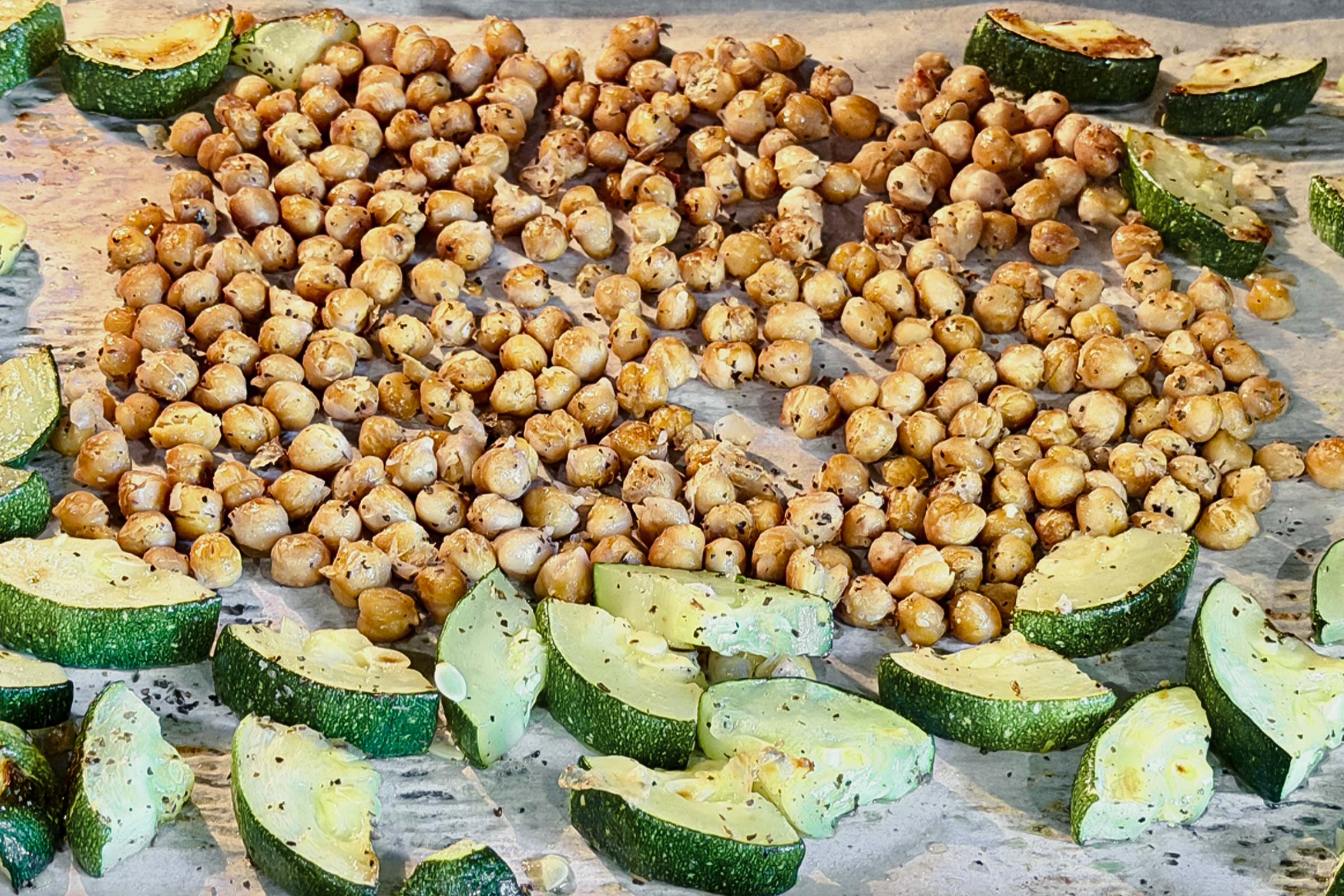 6074067-roasted-chickpeas-and-zucchini-on-baking-sheet