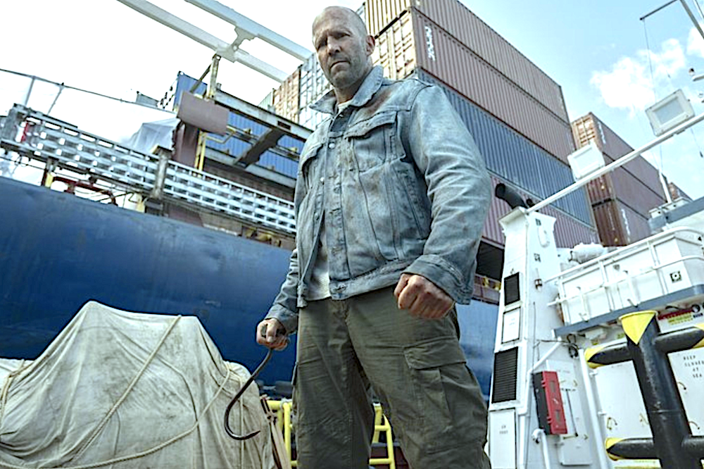 man with metal gaff on cargo vessel in Mutiny