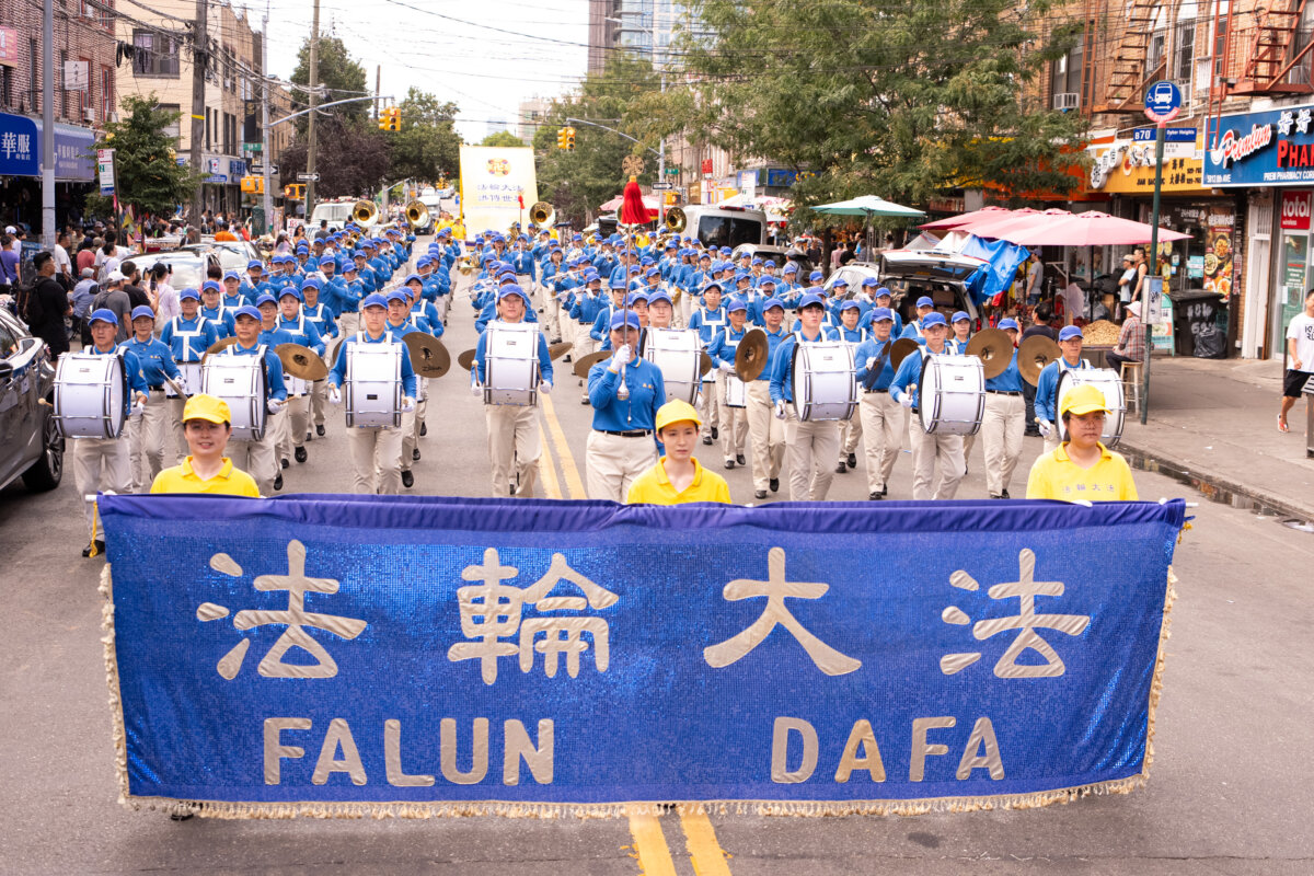 Falun Gong practitioners take part in a march in Brooklyn, New York City, on Aug. 23, 2026. (Larry Dye/The Epoch Times)