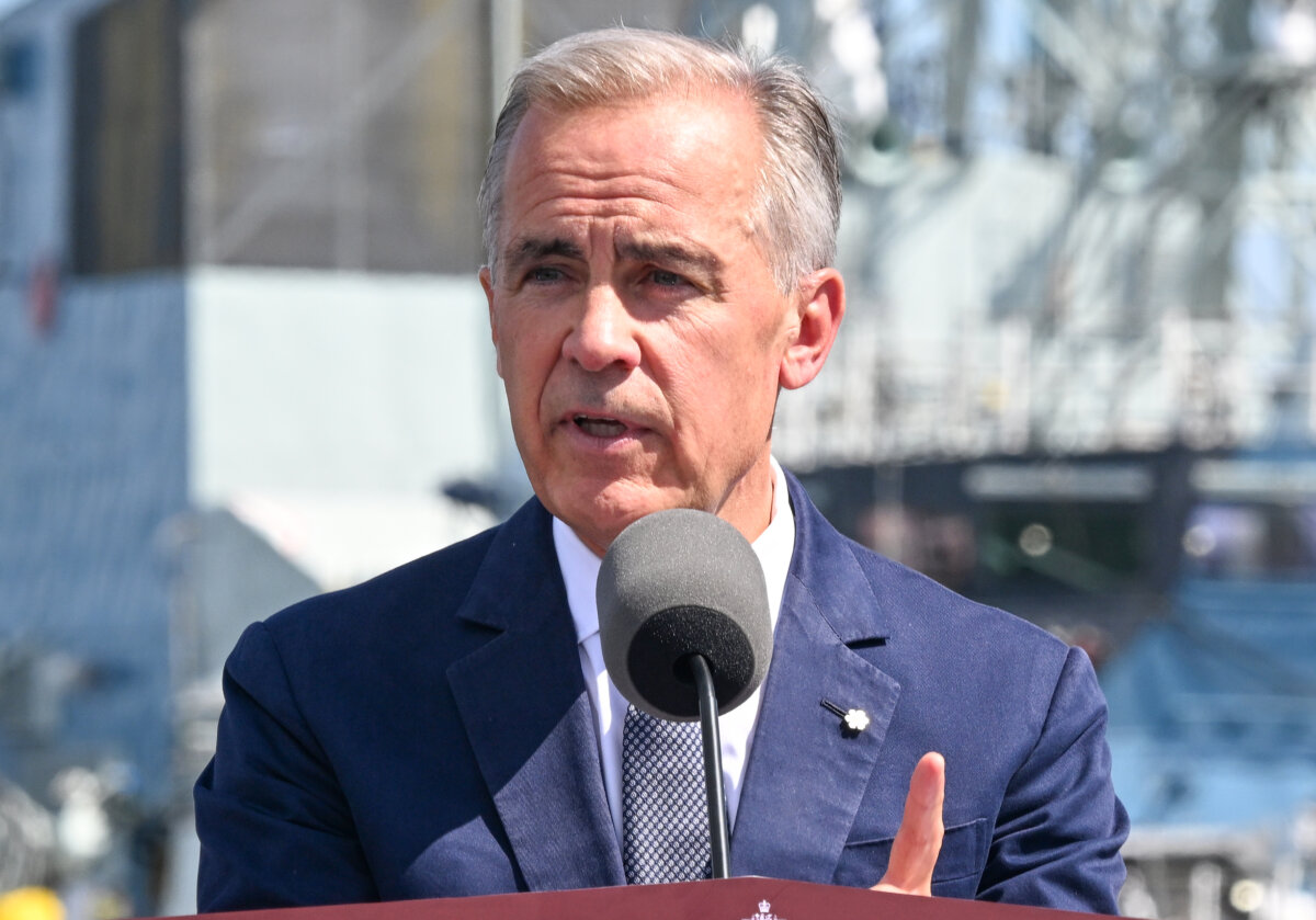 Prime Minister Mark Carney speaks during an announcement at the Davie shipyard in Levis, Quebec, on Aug. 24, 2026. (The Canadian Press/Jacques Boissinot)