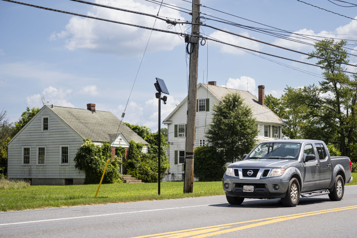 Two Flock cameras in a neighborhood in Jessup, Md., on Aug. 26, 2026. (Madalina Kilroy/The Epoch Times)
