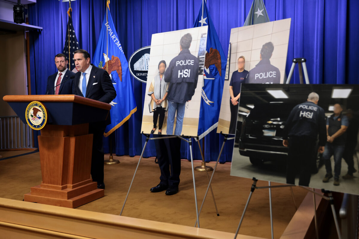 U.S. Attorney General Todd Blanche (C) speaks alongside Secretary of Homeland Security Markwayne Mullin (L) and U.S. Attorney Daniel Rosen (R) for the District of Minnesota during a news conference at the Robert F. Kennedy Department of Justice building in Washington on Sept. 30, 2026. (Anna Moneymaker/Getty Images)