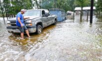 Former Tropical Storm Edouard Lingers Over Texas, Flooding Homes and Roadways