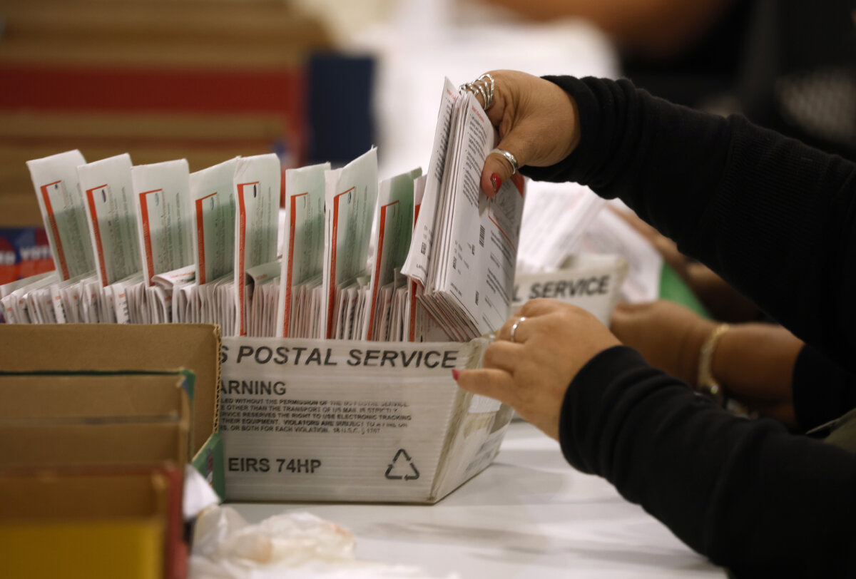 An election worker processes mail-in ballots for the California state primary election at the Los Angeles County Ballot Processing Center in City of Industry, Calif., on June 5, 2026. (Justin Sullivan/Getty Images)