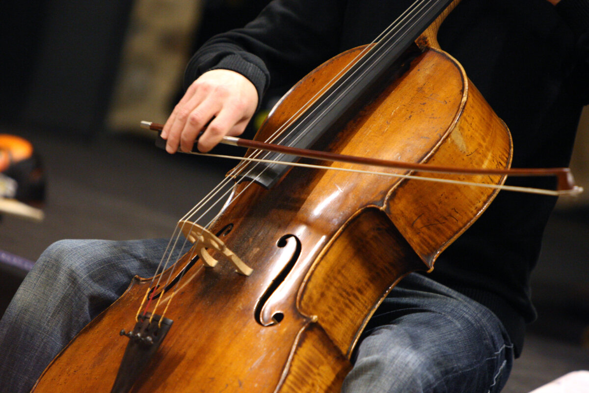 A cellist plays during a rehearsal in a file photo. (Kenzo Tribouillard/AFP via Getty Images)