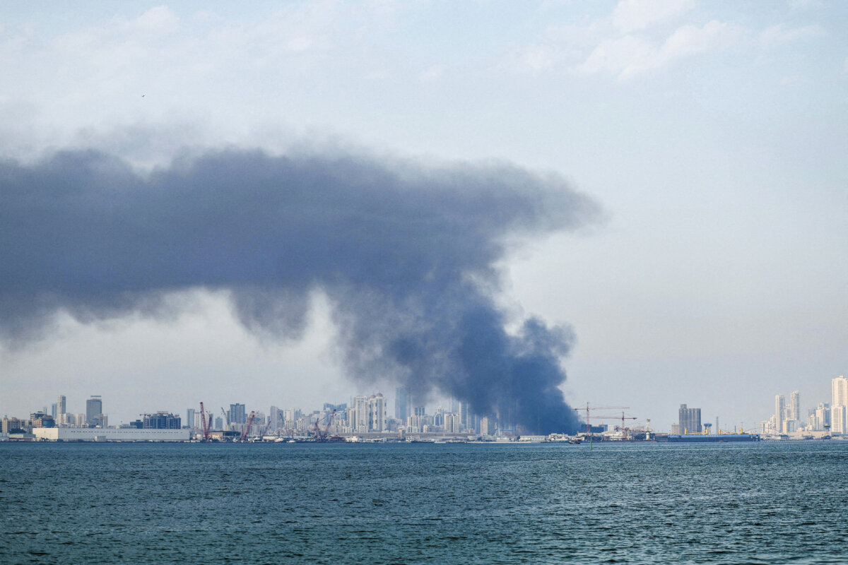 Smoke rises after reported Iranian missile attacks, following strikes by the United States and Israel against Iran, in Manama, Bahrain, February 28, 2026. REUTERS/Stringer