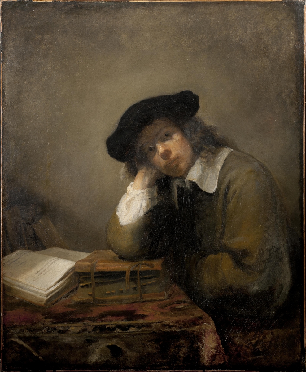 A Young Student at His Desk