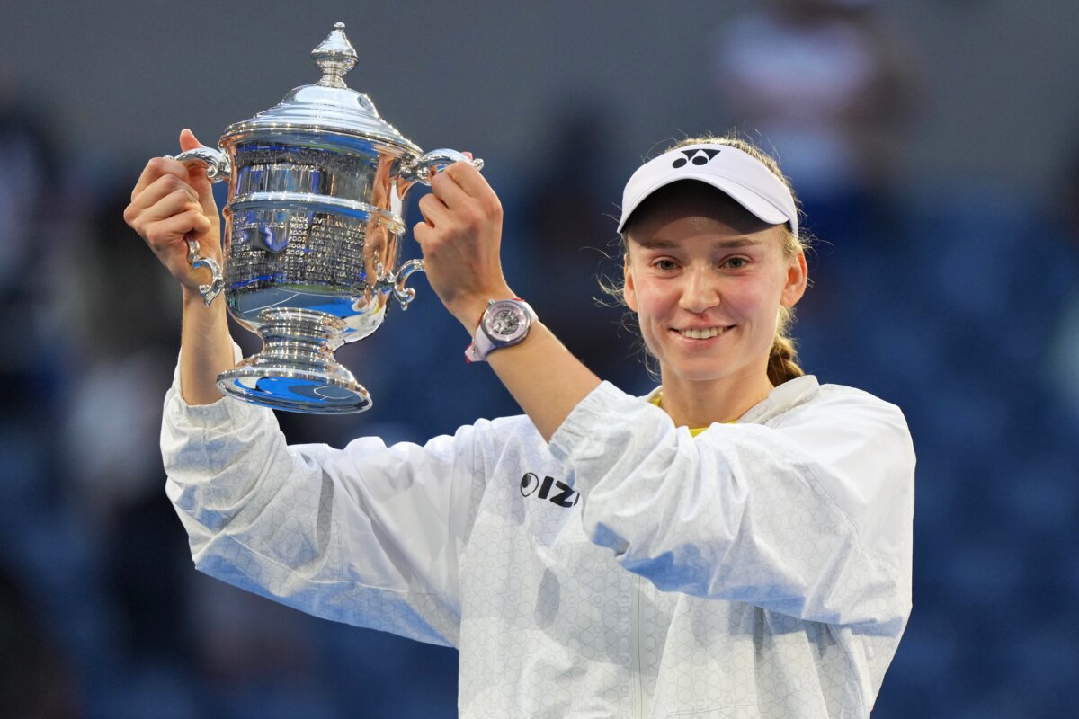 Elena Rybakina of Kazakhstan holds the trophy after she won the women's singles final of the U.S. Open tennis championships against Aryna Sabalenka of Belarus in New York City on Sept. 12, 2026. (Kirsty Wigglesworth/AP Photo)
