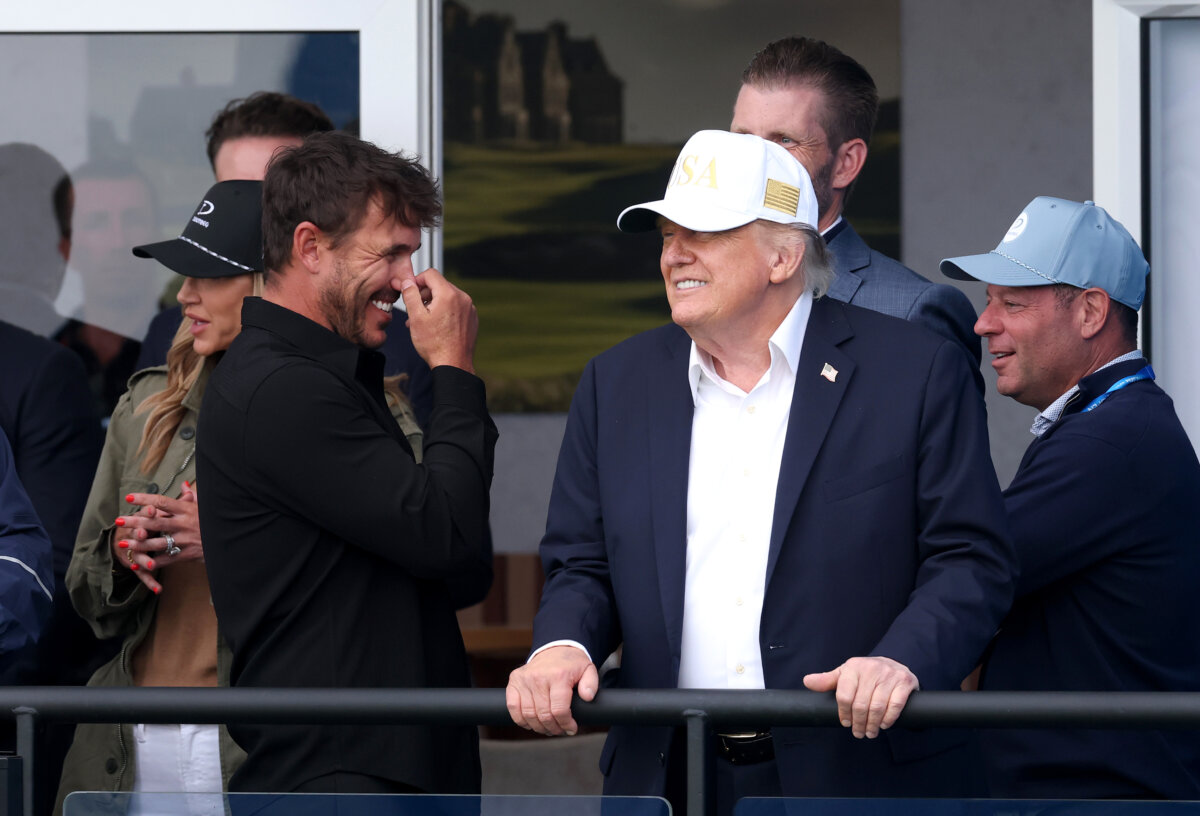 Brooks Koepka (L) of the United States speaks with U.S. President Donald Trump (R) at the Amgen Irish Open at Trump International Golf Links in Doonbeg in Clarecastle, Ireland, on Sept. 12, 2026. (Warren Little/Getty Images)