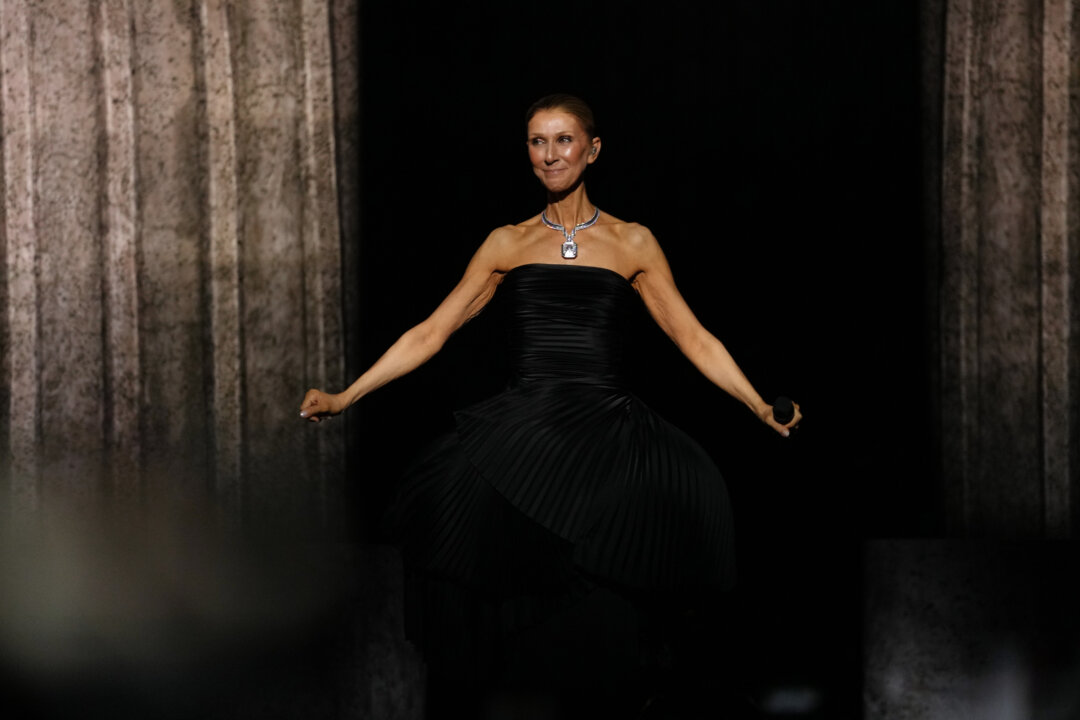 Cover image for Celine Dion Stumbles and Falls Mid-Set During Paris Residency Show