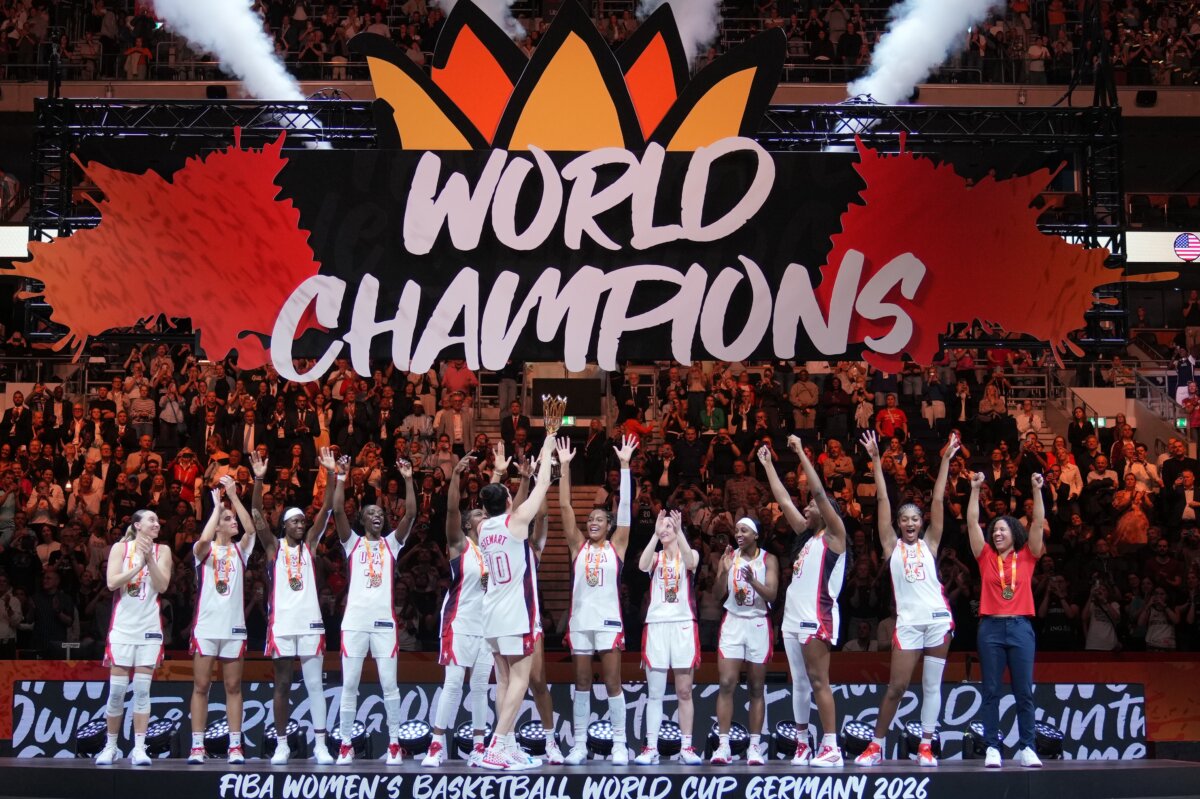 United States team stands on the podium after winning the Women's Basketball World Cup final match between the United States and France in Berlin, Sunday, Sept. 13, 2026. (Ebrahim Noroozi/AP Photo)