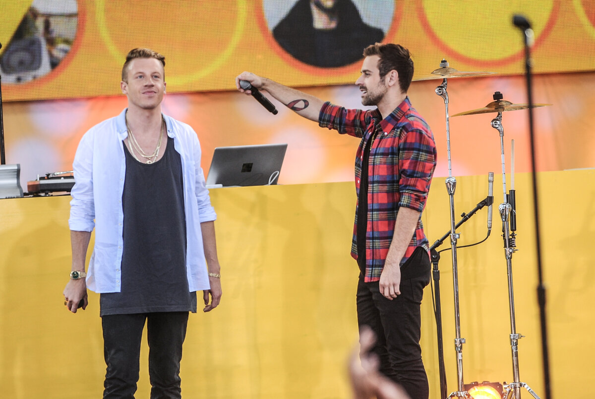 Macklemore (L) and Ryan Lewis perform at the Good Morning America Concert Series at Central Park's Rumsey Playfield in New York City on Dec. 6, 2013. (Brad Barket/Invision/AP)