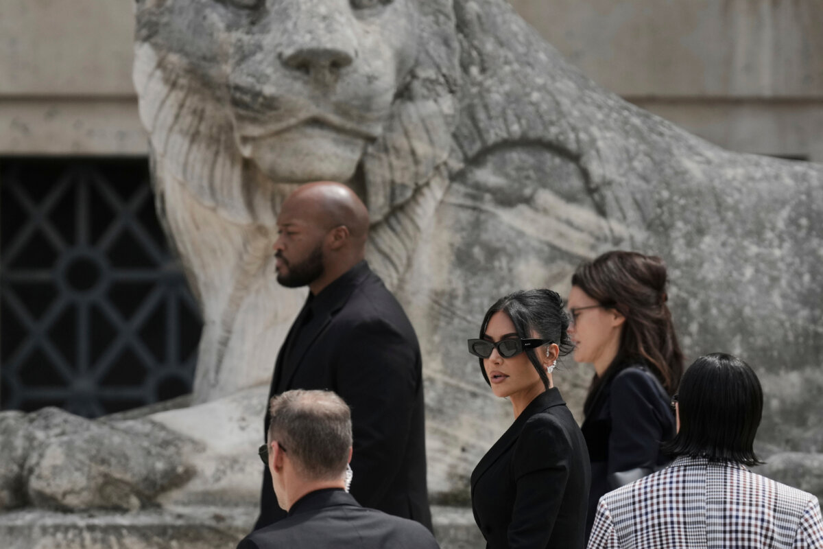 Kim Kardashian, center, arrives to testify regarding a robbery of millions of dollars in jewels from her Paris hotel room in 2016, in Paris on May 13, 2025. (Aurelien Morissard/AP Photo)