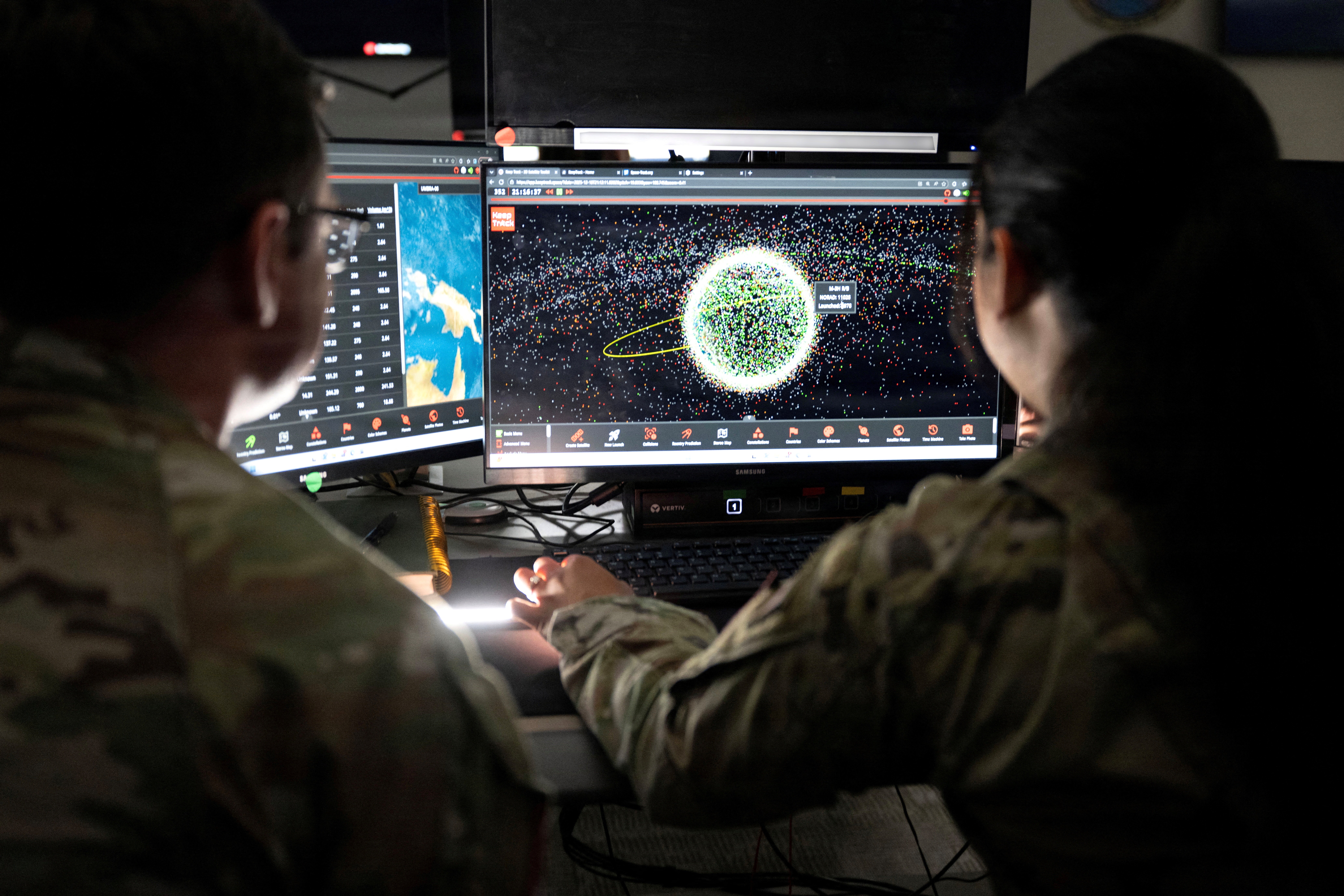 Space Force Guardians assigned to Space Delta 5 monitor a computer workstation