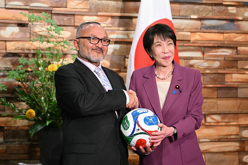 Japan's Prime Minister Sanae Takaichi (R) gives a football with her autograph to Solomon Islands' Prime Minister Matthew Wale during the Japan-Solomon Islands Summit at the Prime Minister's Office in Tokyo, Japan on July 23, 2026. (Philip Fong/AFP via Getty Images)