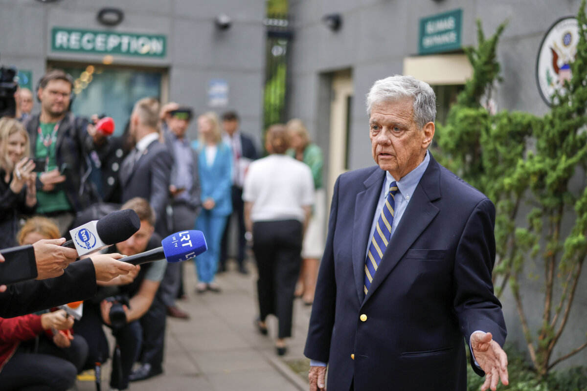 Presidential envoy John Coale speaks to journalists outside the U.S. Embassy in Vilnius, Lithuania, on Sept. 11, 2025, ahead of the arrival of released prisoners from Belarus. (AP Photo/Mindaugas Kulbis)