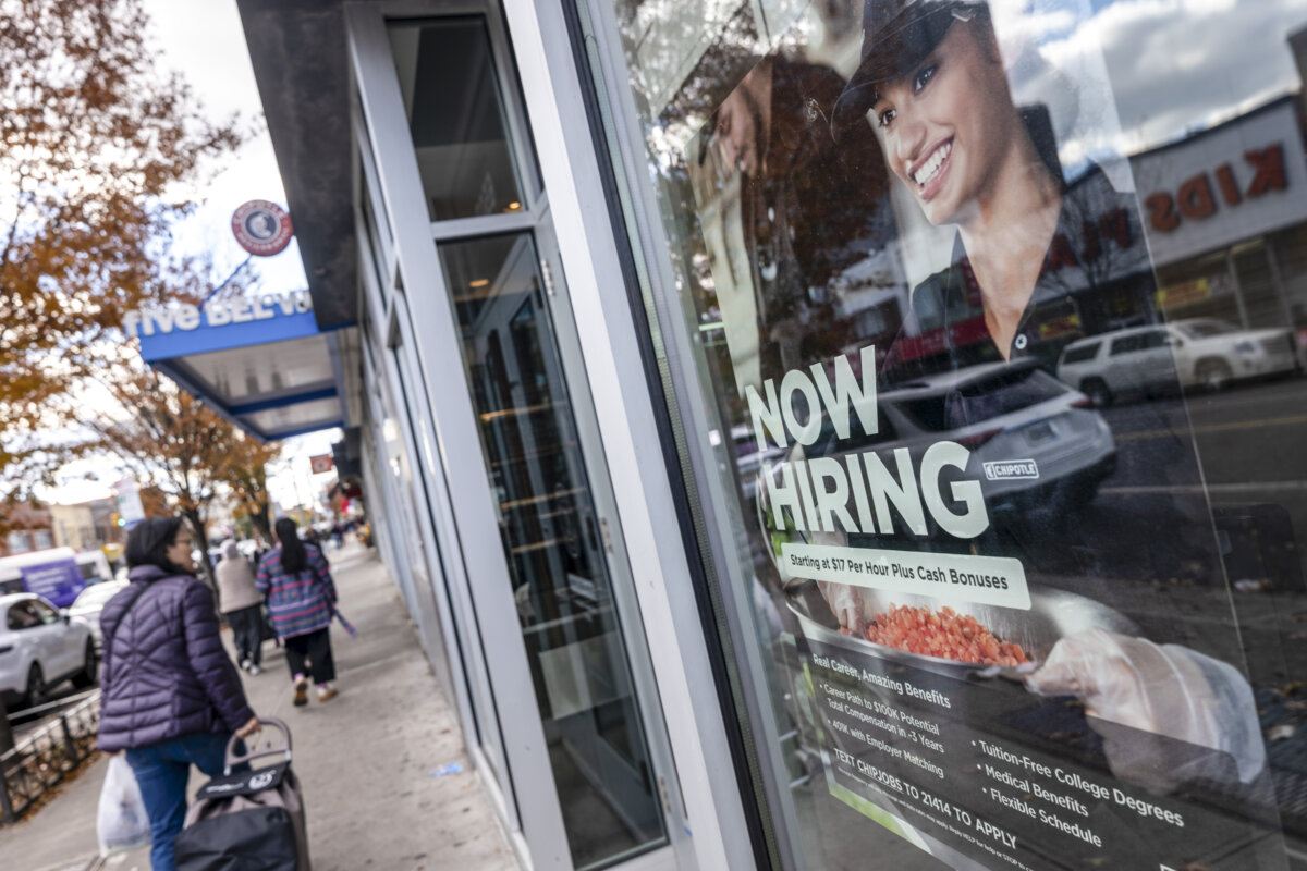A "Now Hiring" sign at a Chipotle location in the Brooklyn borough of New York City, on November 06, 2025. (Spencer Platt/Getty Images)
