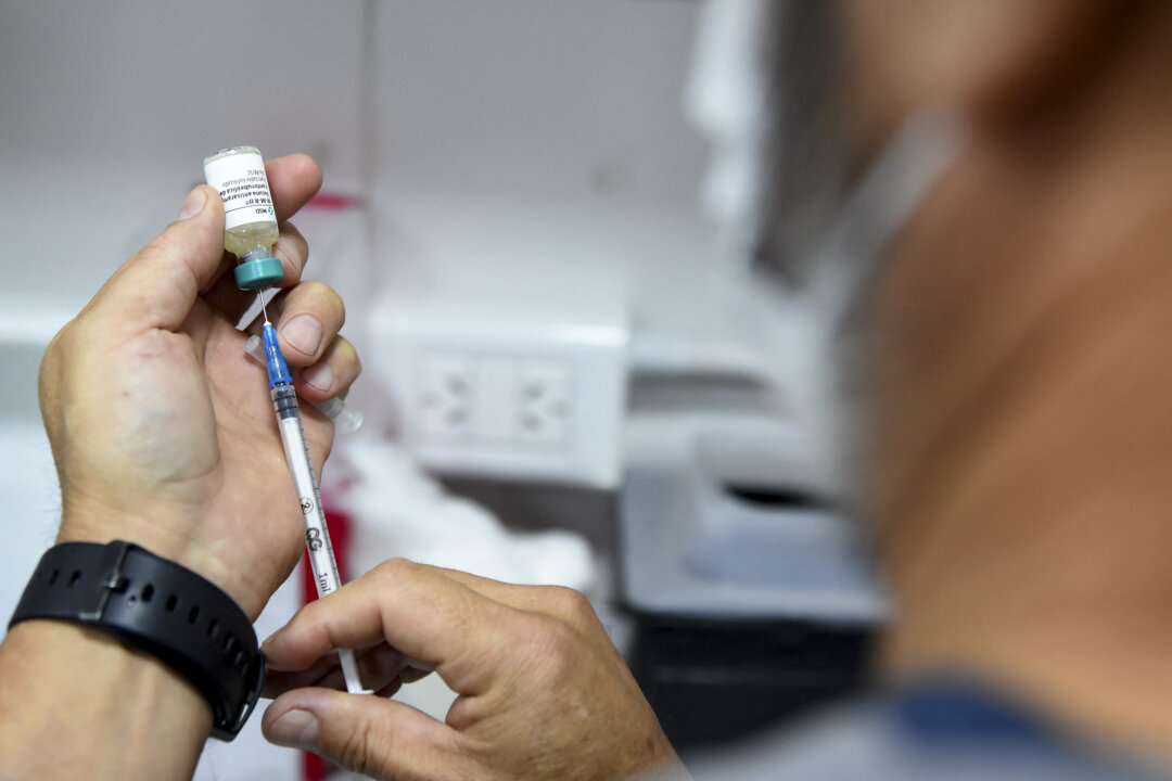 A nurse prepares to administer the vaccine in Argentina, on December 15, 2025. (Andres Larrovere / AFP via Getty Images)