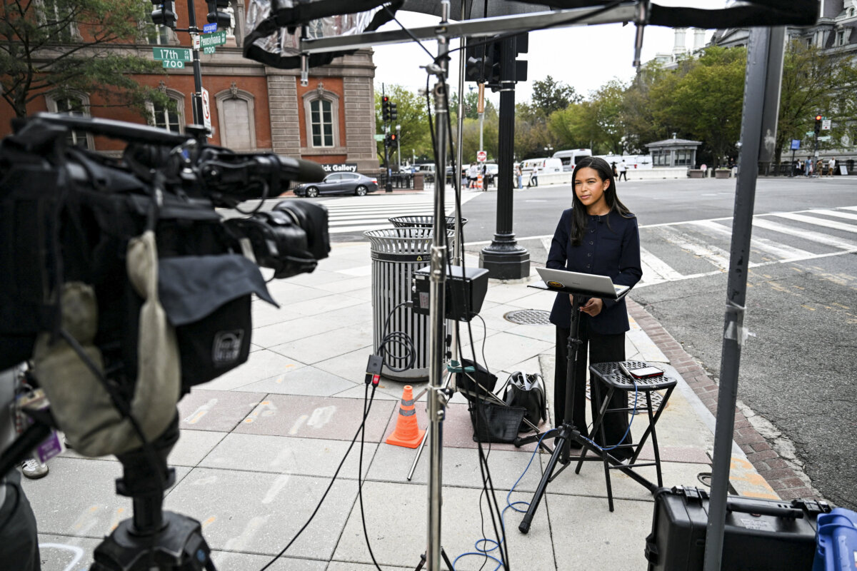 MS Now correspondent Akayla Gardner reports outside the White House grounds after President Donald Trump banned MS Now, CNN, and Politico in a Truth Social post, in Washington, on Sept. 20, 2026. (REUTERS/Annabelle Gordon)