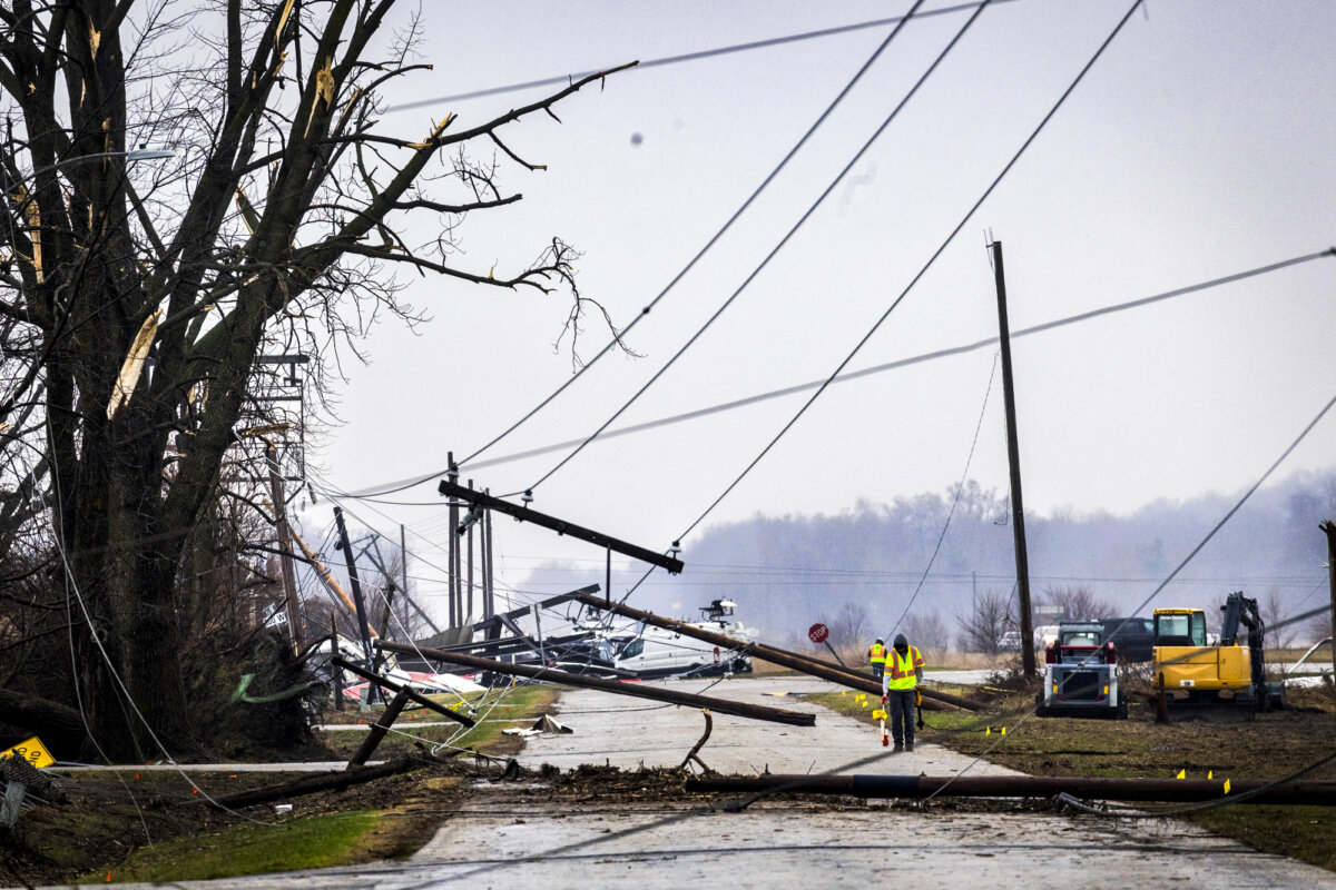 Power lines are draped across the road after a tornado passed through the small town of Lake Village, Ind., on March 11, 2026. (Scott Olson/Getty Images)