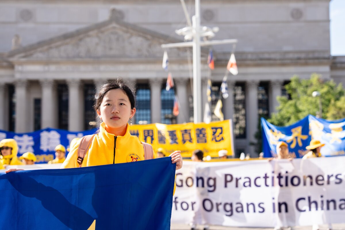 Falun Gong practitioners hold a rally to demand an end to the Chinese Communist Party's persecution of the spiritual practice, during Chinese leader Xi Jinping's state visit to Washington on Sept. 24, 2026. (Samira Bouaou/The Epoch Times)