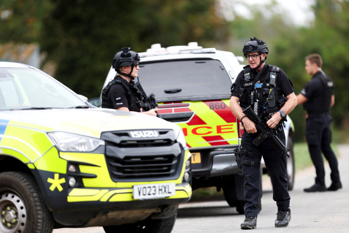 Armed police officers attend a suspected terrorist incident at RAF Fairford airbase in Fairford, England, on Sept. 27, 2026. (Toby Shepheard/Reuters)