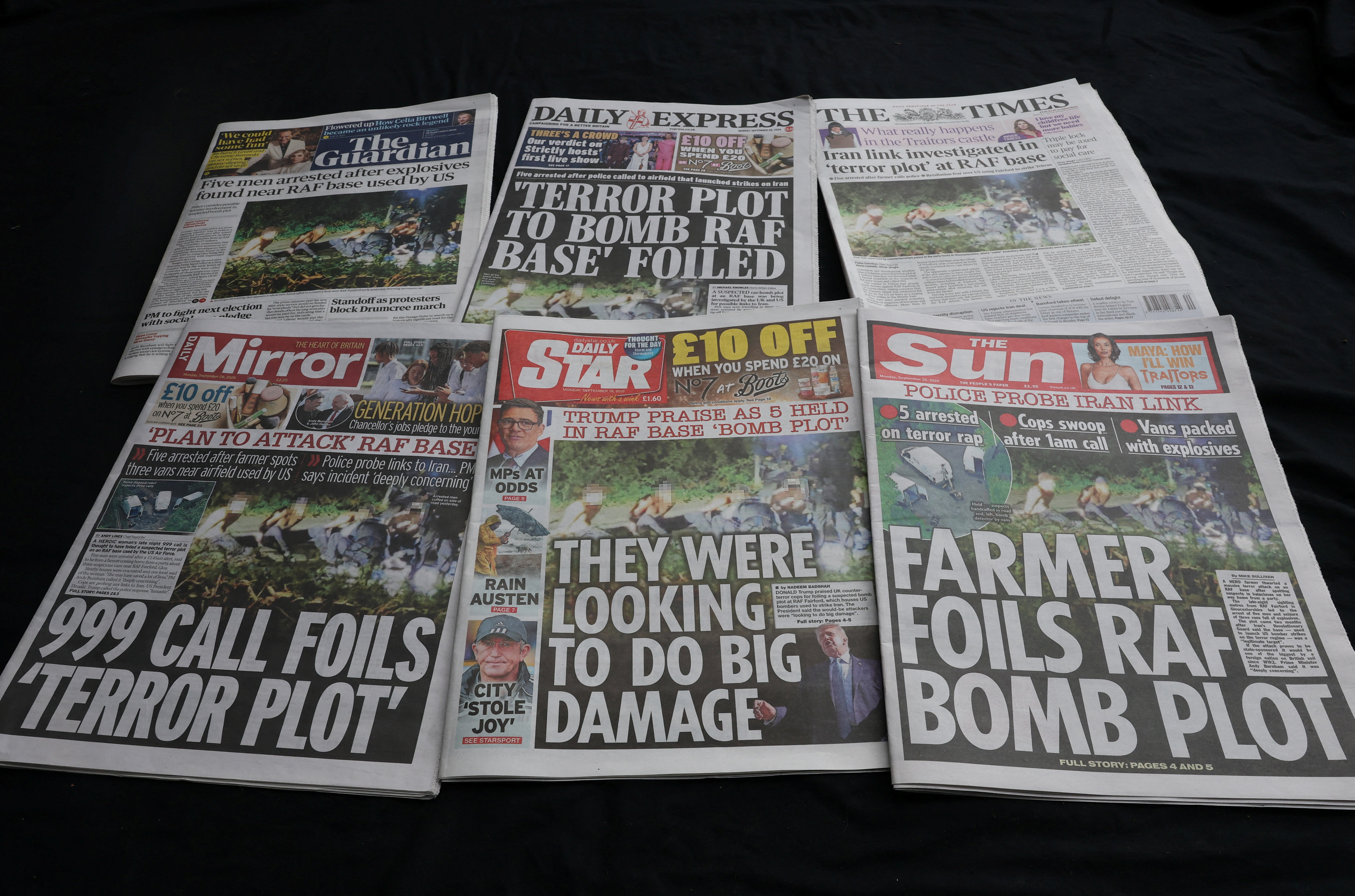 Illustration shows British newspaper front pages
