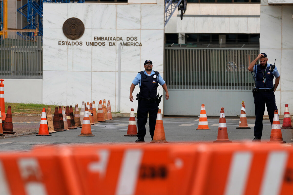 Security personnel stand outside the U.S. embassy after consular services were suspended due to security concerns in Brasilia, Brazil, on Oct. 2, 2026. (Eraldo Peres/AP Photo)