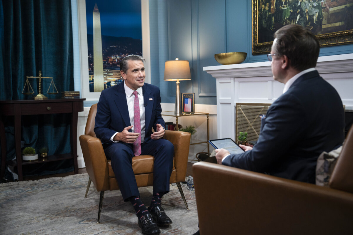 Attorney General Todd Blanche and host of “American Thought Leaders” Jan Jekielek speak in Washington on Oct. 5, 2026. (Madalina Kilroy/The Epoch Times)