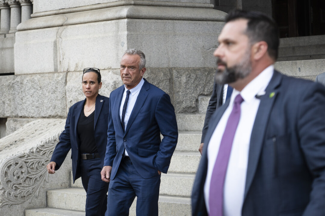 Health Secretary Robert Kennedy Jr. walks out of Waldorf Astoria in Washington on May 18, 2026. (Madalina Kilroy/The Epoch Times)