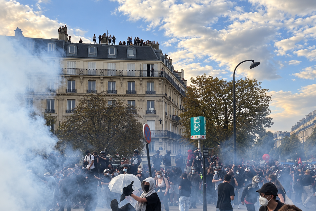 Day in Photos: Paris Student Protests, Nobel Physics Prize, and Camel Racing Season
