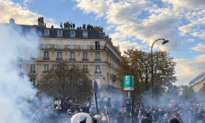 Day in Photos: Paris Student Protests, Nobel Physics Prize, and Camel Racing Season