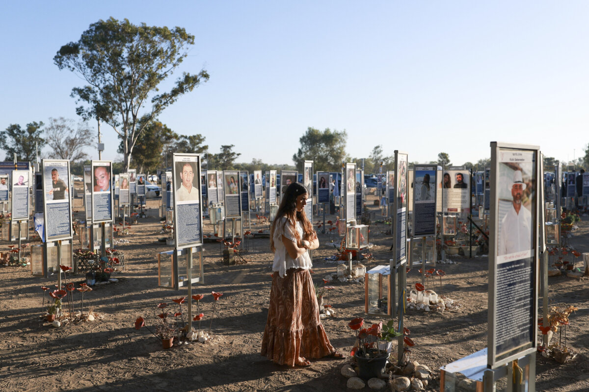 A woman visits the site of the Nova music festival, where partygoers were killed and kidnapped during the deadly Hamas-led Oct. 7, 2023, attack, on the third anniversary of the attack, near Reim, Israel, on Oct. 7, 2026. (Ronen Zvulun /Reuters)