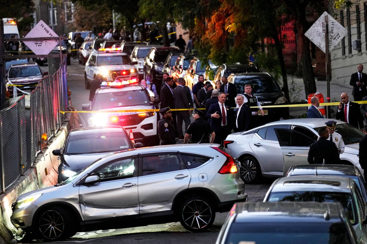 Law enforcement work the scene of a shooting in New York on Oct. 8, 2026. (Seth Wenig/AP Photo)