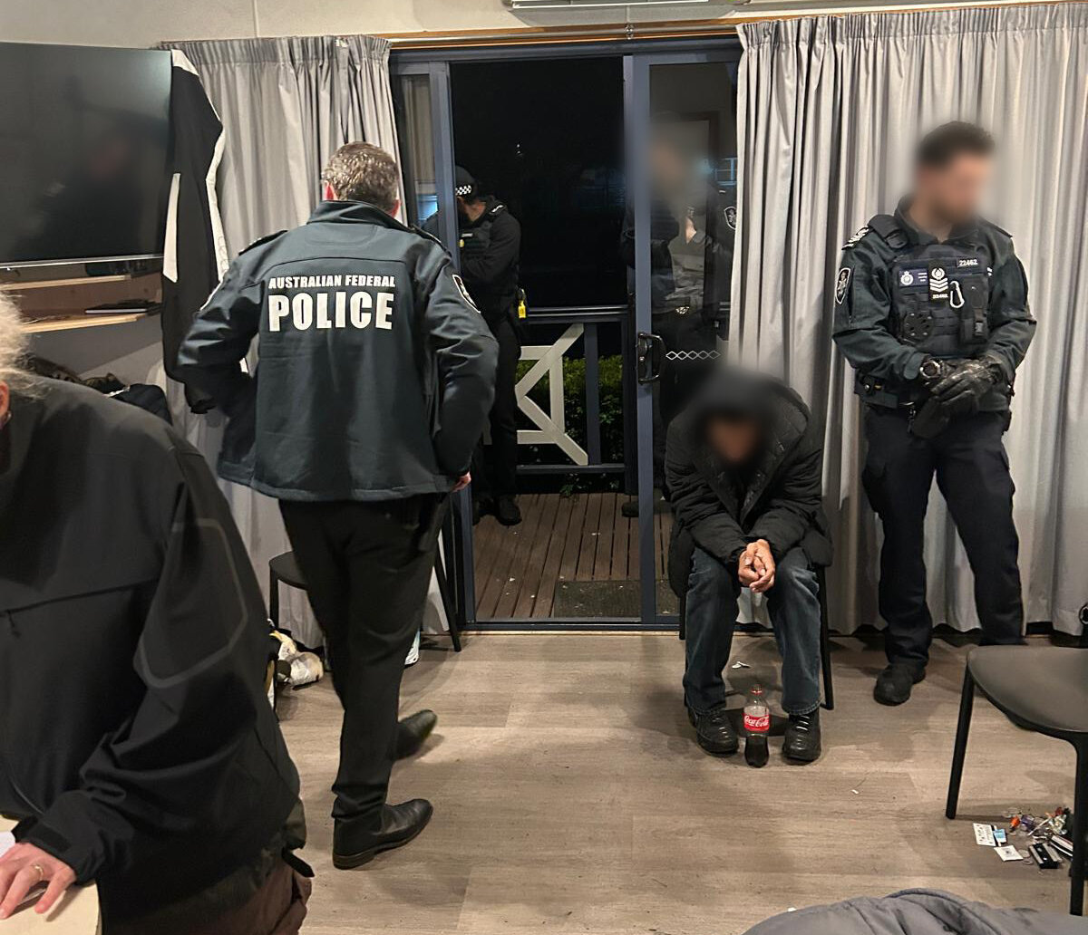 Police arrest a Sydney man accused of impersonating government officials in an alleged $1.5 million Medicare rort. (Courtesy of Australian Federal Police)