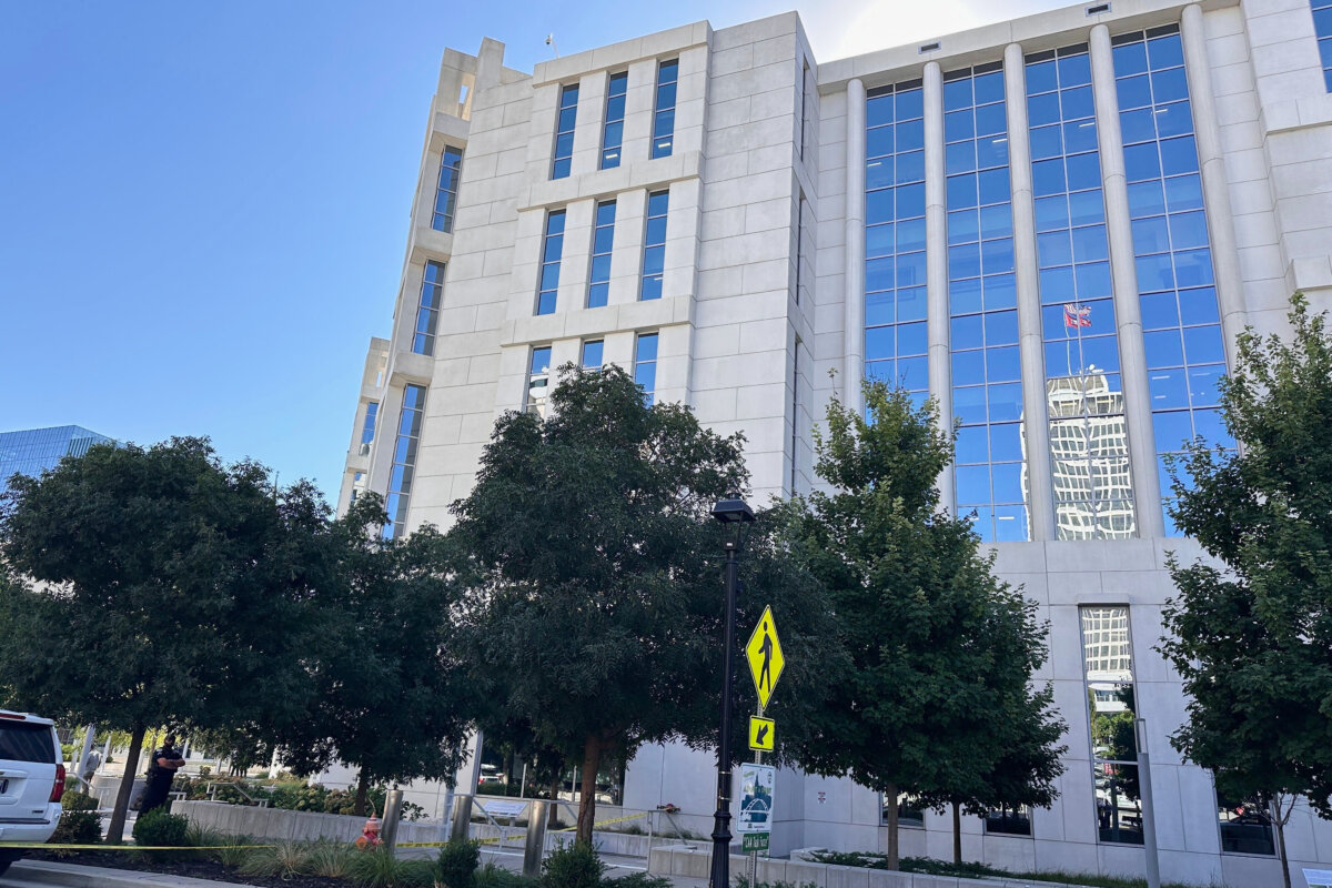 Law enforcement responds to a shooting at the federal courthouse in Nashville, Tenn., on Oct. 8, 2026. (Kristin Hall/AP Photo)