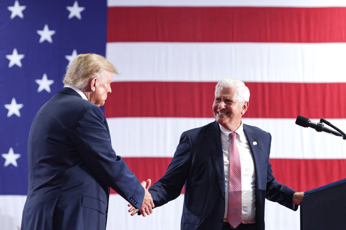 President Donald Trump shakes hands with New York Republican gubernatorial nominee Bruce Blakeman on stage during an election rally at the Oncenter in Syracuse, N.Y., on Oct. 9, 2026. (Alex Wong/Getty Images)