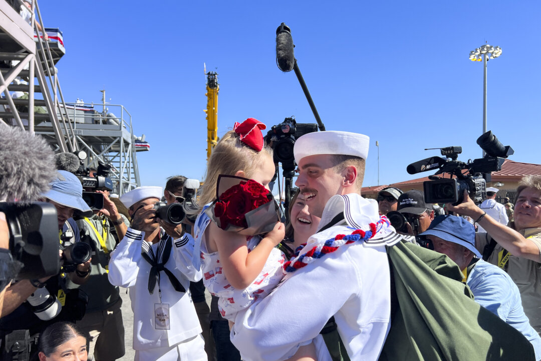 America in Photos: USS Lincoln Returns, America’s Innovation Awards, and California Coastal Flooding