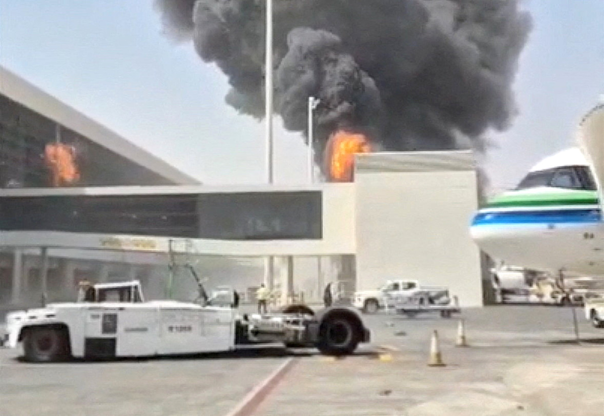 Smoke and flames rise from King Khalid Airport, after Yemen's Iran-backed Houthis said they attacked the airport, in Riyadh, Saudi Arabia, on Oct. 8, 2026. (Screenshot via Social Media/Reuters)