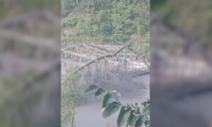 Nepal Bridge Collapses Under Force of Floodwaters