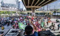 Day in Photos: Protest in Bangkok, Australian–Indonesian Military Training, and Flooding in Istanbul
