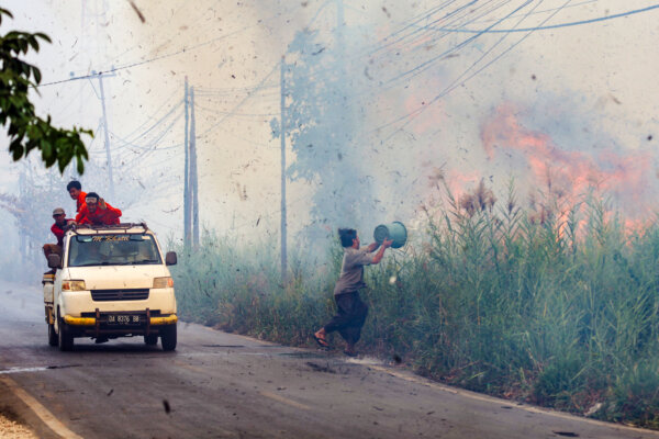 Day in Photos: Fire in Indonesia, Protests in Italy and France, and Elections in Israel