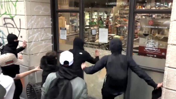 Milan Police Clash With Rioters Amid Looting