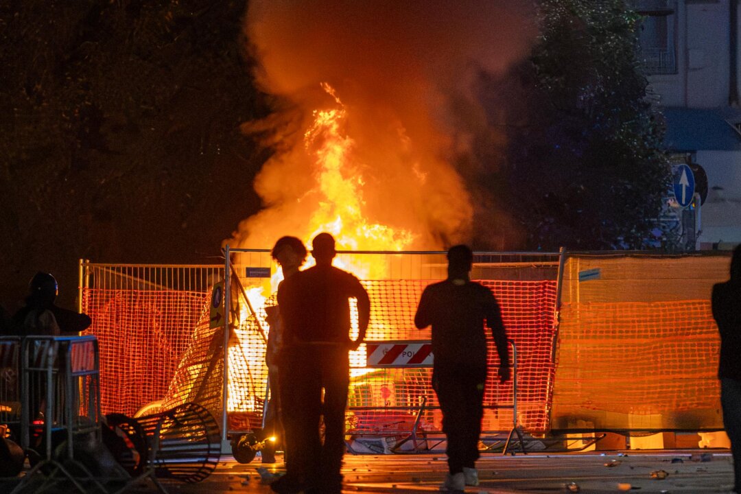 Italy Approves Security Crackdown in Wake of Northern City Riots