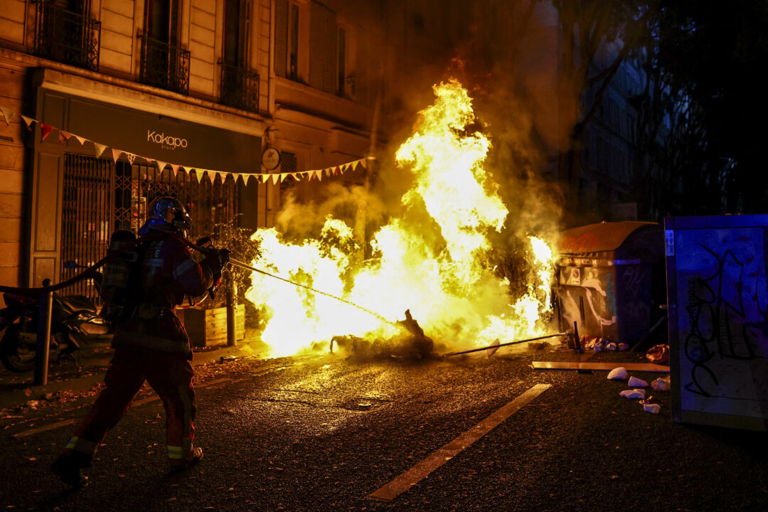 Day in Photos: France Protest Fire, Lithuania Drone Military Exercise, and Wings Over Ganges