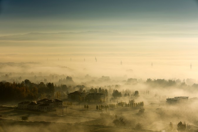 Haze covers the town of Bar Elias in Bekaa Valley, Lebanon, on Dec. 9, 2016. (Patrick Baz/AFP/Getty Images)